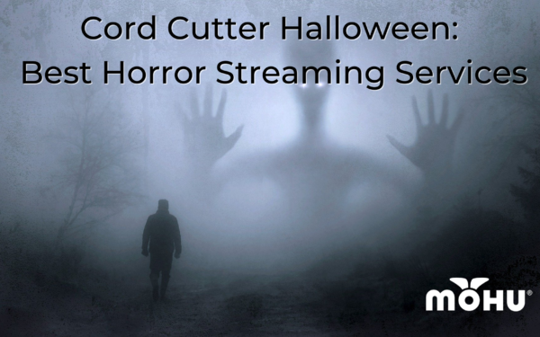 scary image of man walking alone at night in the woods with a ghost up in the sky, Cord Cutter Halloween: Best Horror Streaming Services, mohu logo