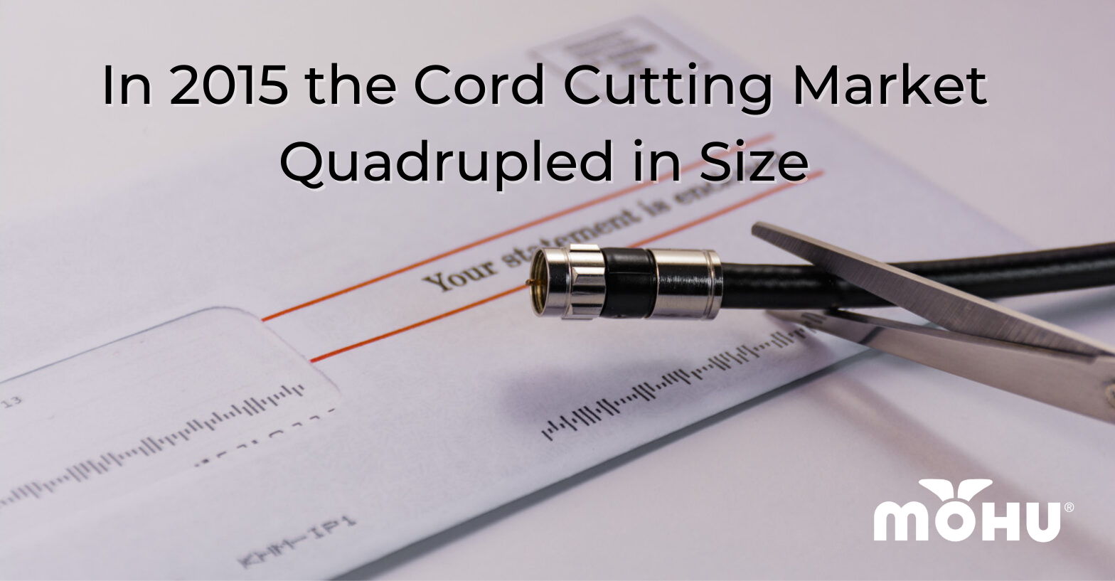 bill on table with a cord being cut on top of it, In 2015 the Cord Cutting Market Quadrupled in Size, mohu logo