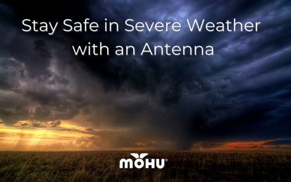 image of a field with a dark stormy sky, Stay Safe in Severe Weather with an Antenna and the mohu logo
